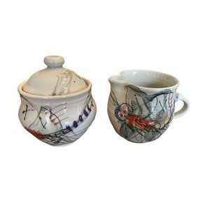 Art Pottery Sugar Bowl and Creamer Bug Designed Signed REB